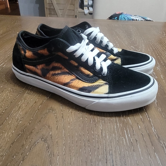 Vans Other - Vans Old skool.Used, no box.Size: 8 men, 9.5 womenColor:Black, white,tiger print